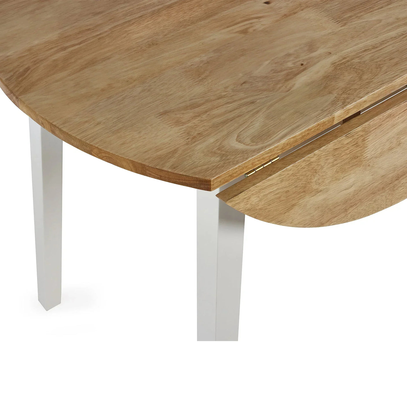 Close up of round drop leaf dining table with light wood top and white legs