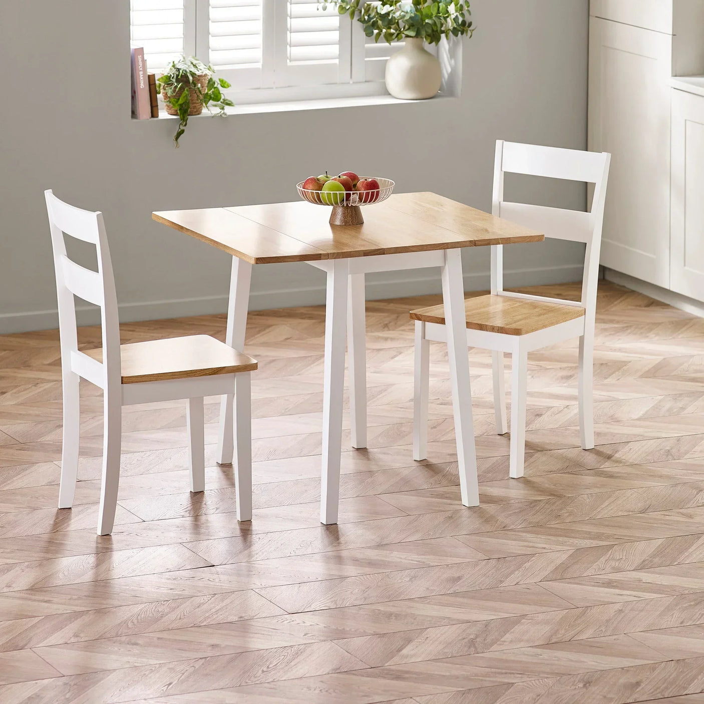 Two seater dining set with white wood table and chairs, natural top, in modern kitchen