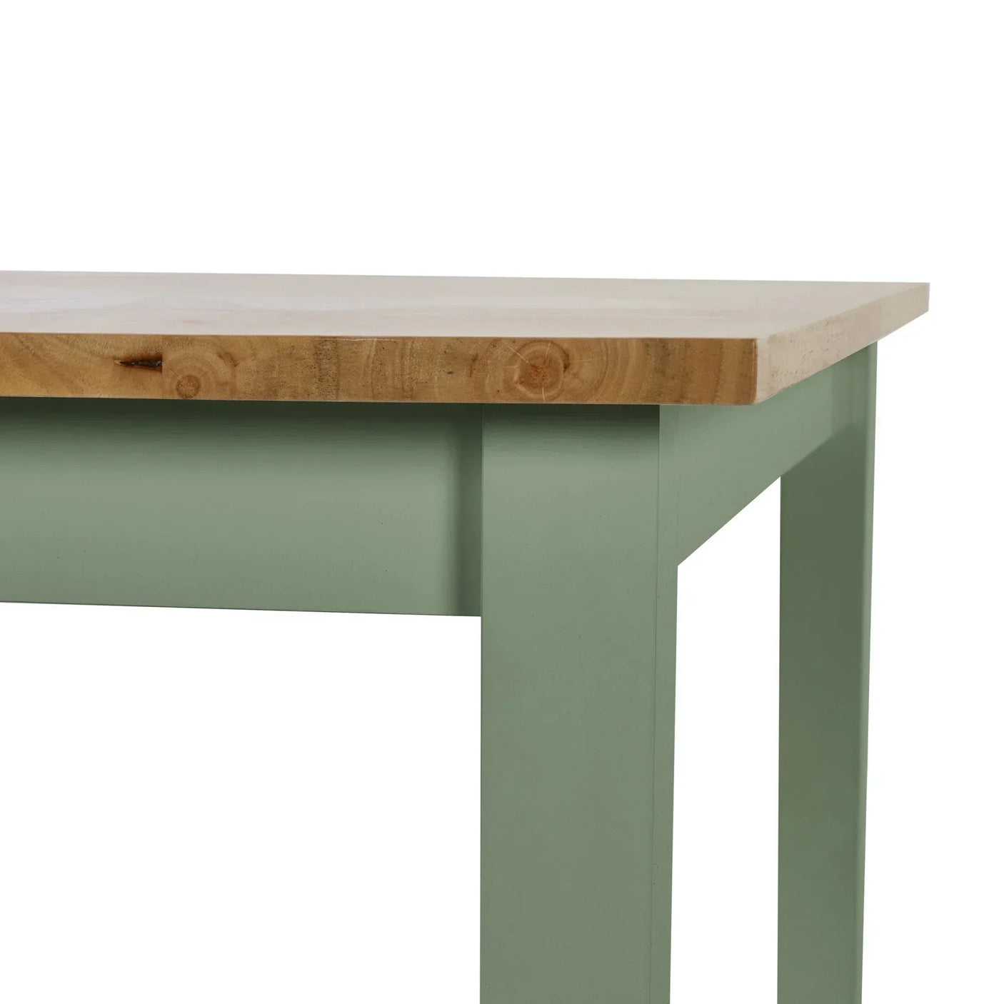 Oak top dining table with sage green painted legs close-up corner view