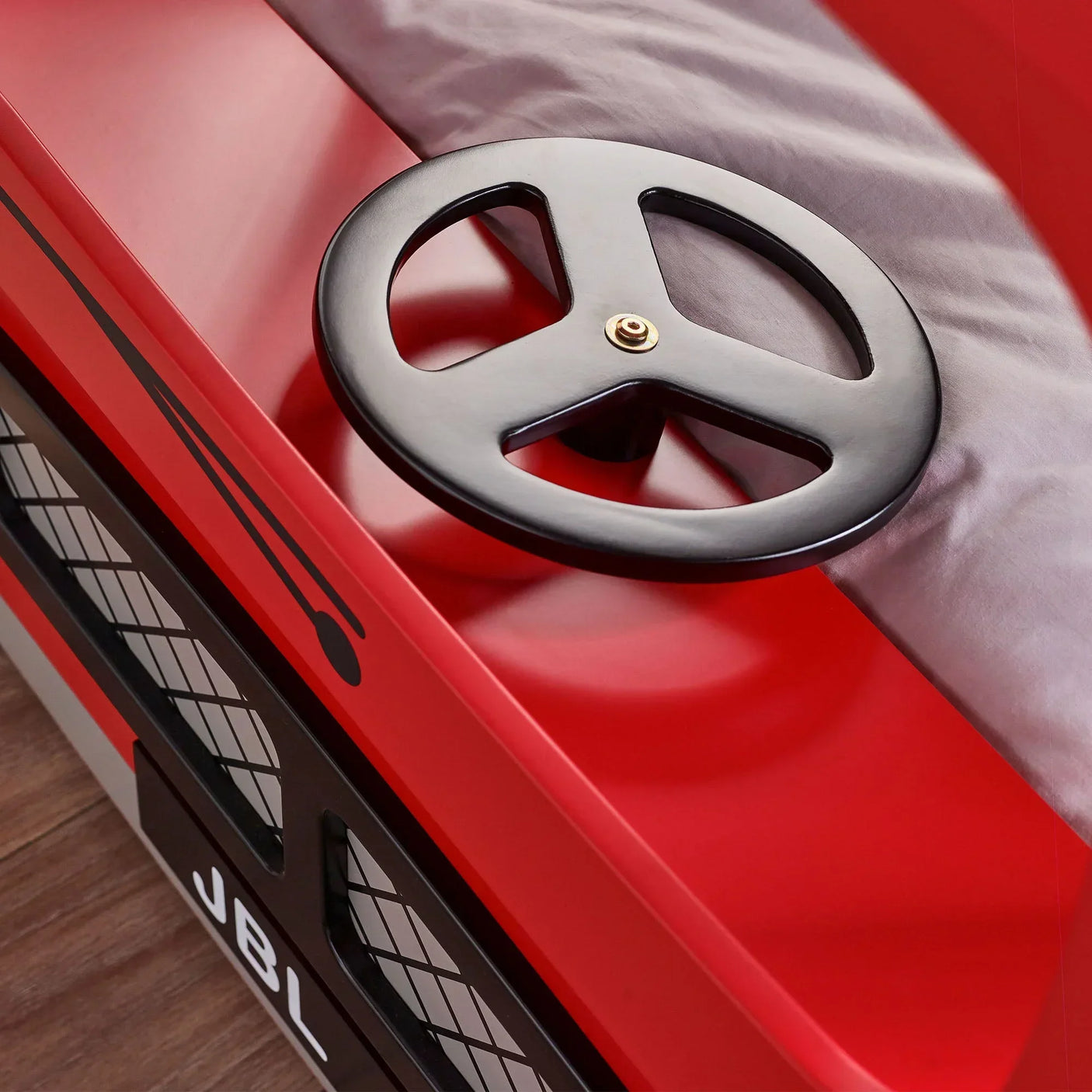 London bus bunk bed with red finish and black steering wheel detail