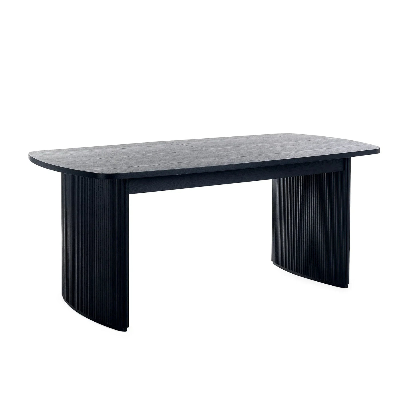 Black fluted extending dining table with rounded ends and curved panel legs on white background