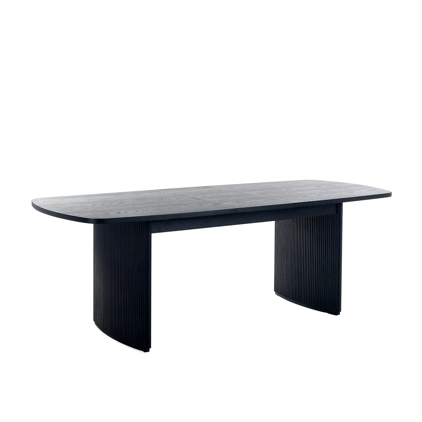 Black fluted extending dining table with rounded edges and ribbed double pedestal base