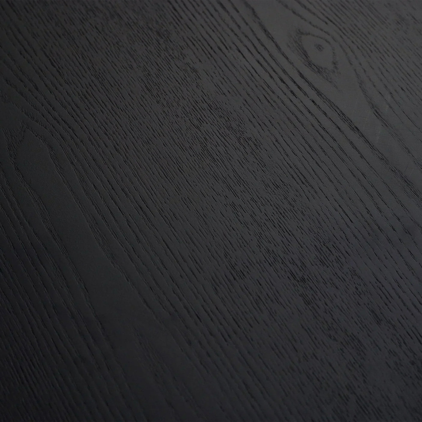 black fluted round coffee table wood grain close up