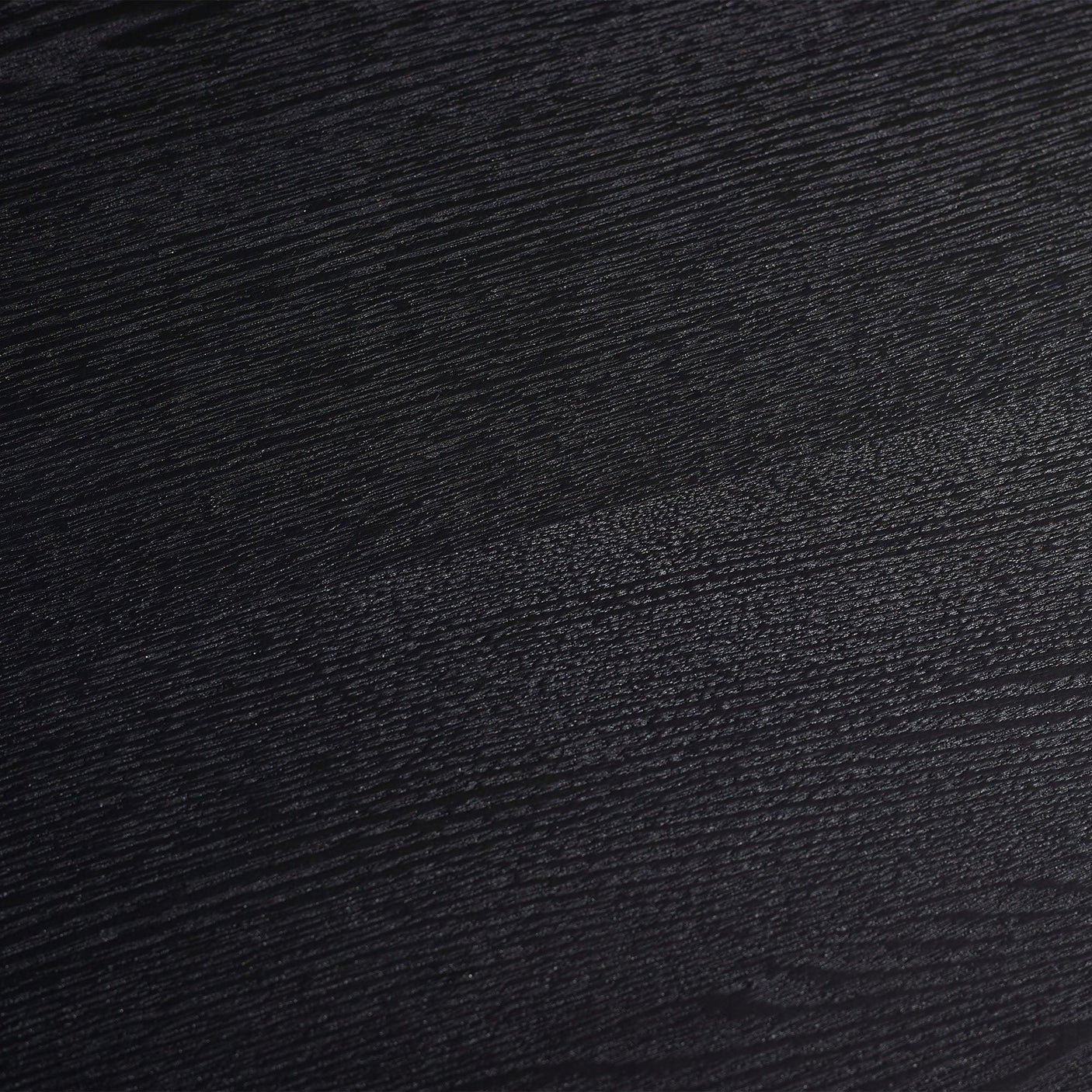 close-up of black fluted coffee table wood grain texture