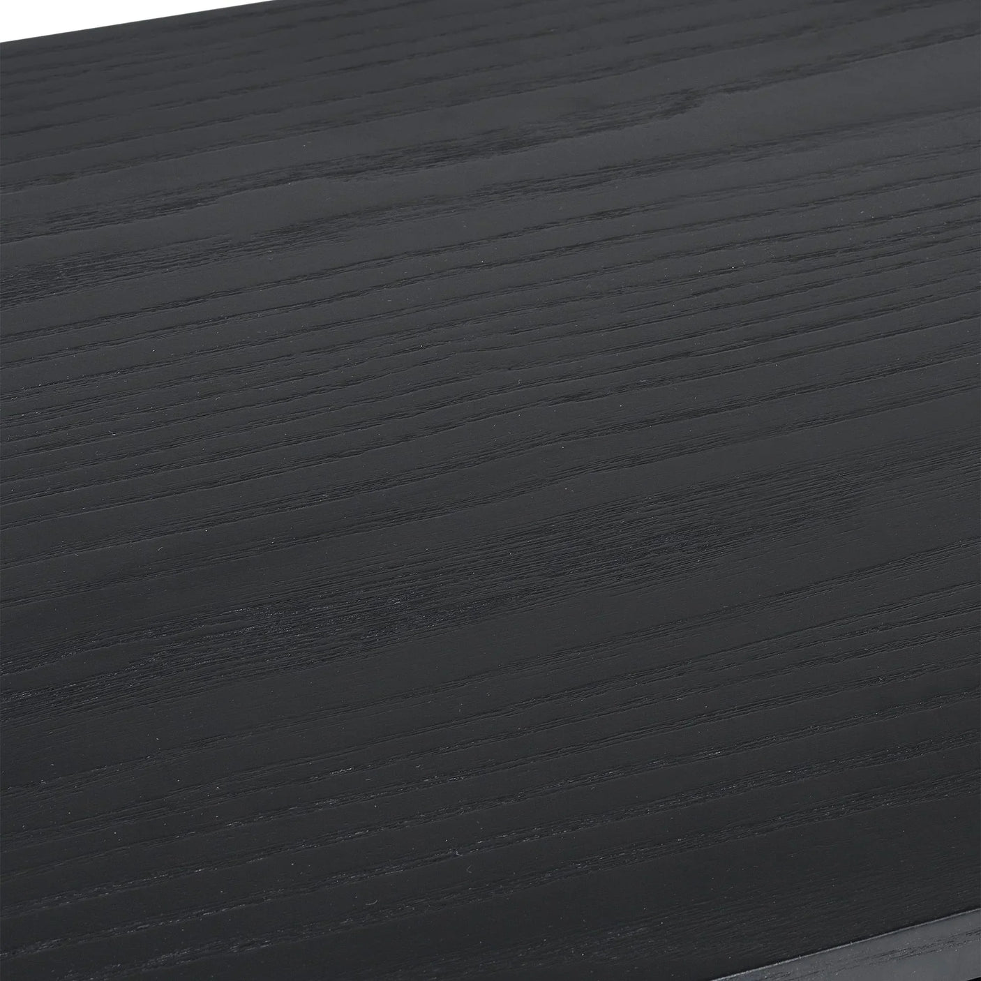 Black fluted TV unit top surface with wood grain texture close-up