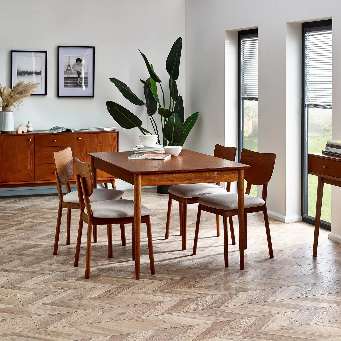 Lowry dining chair set with wooden table in bright modern dining room with parquet floor