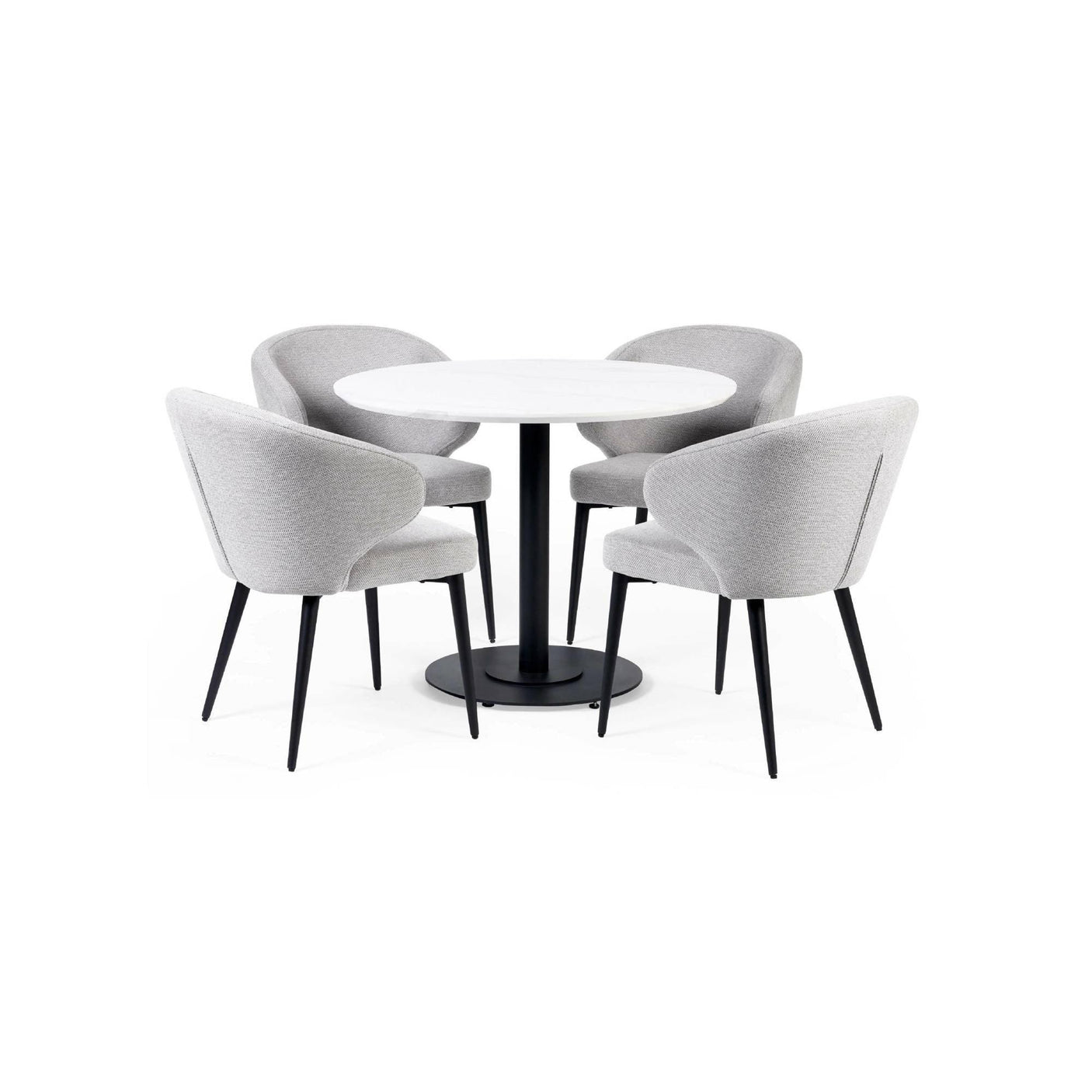 Round white dining table with four grey fabric dining chairs and black metal legs