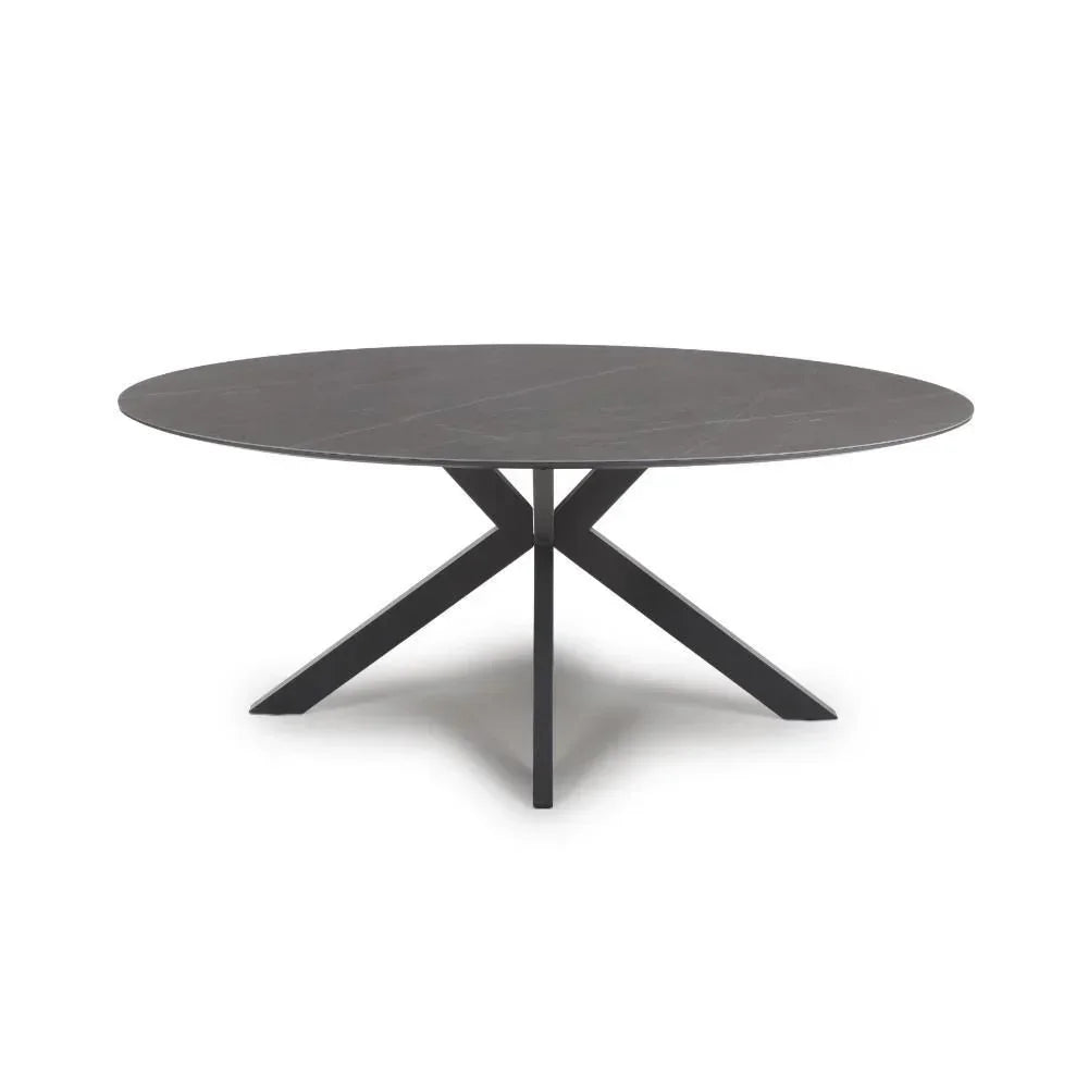 Round black dining table with cross metal legs