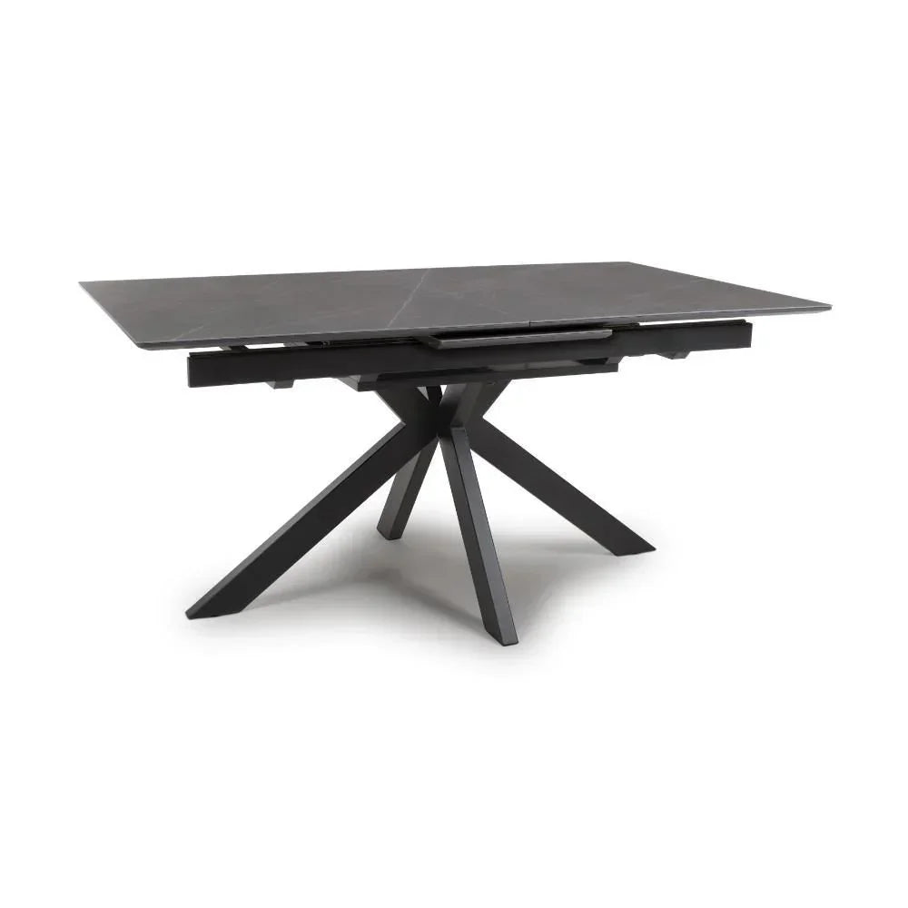 Rectangular dark ceramic dining table with metal spider leg base