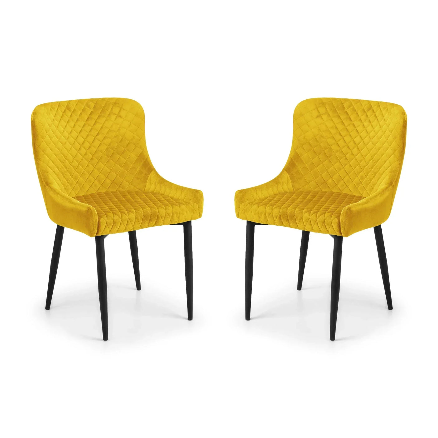 Pair of mustard velvet dining chairs with diamond quilted upholstery and black metal legs