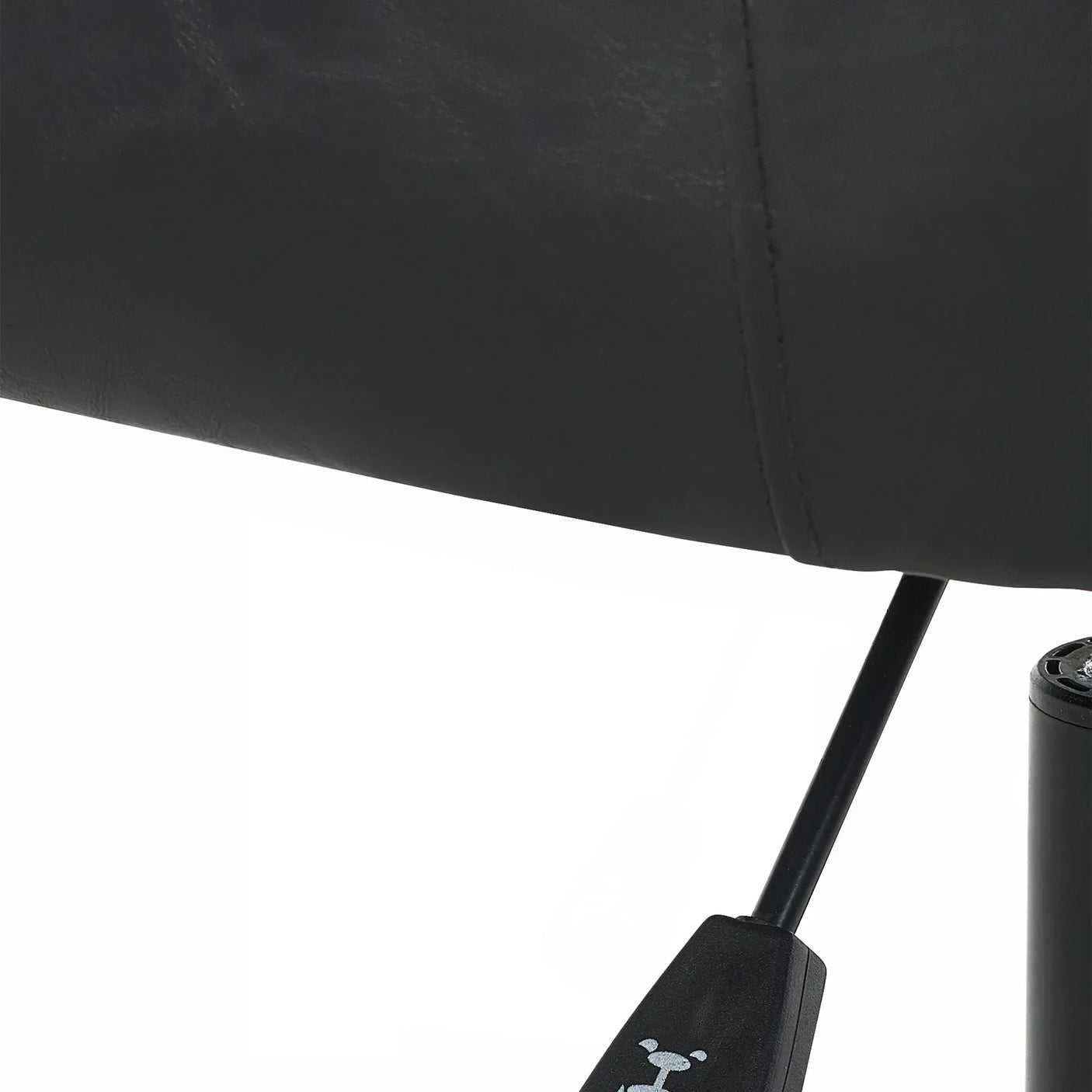 Close-up of Luxe office chair in black faux leather showing seat stitching detail