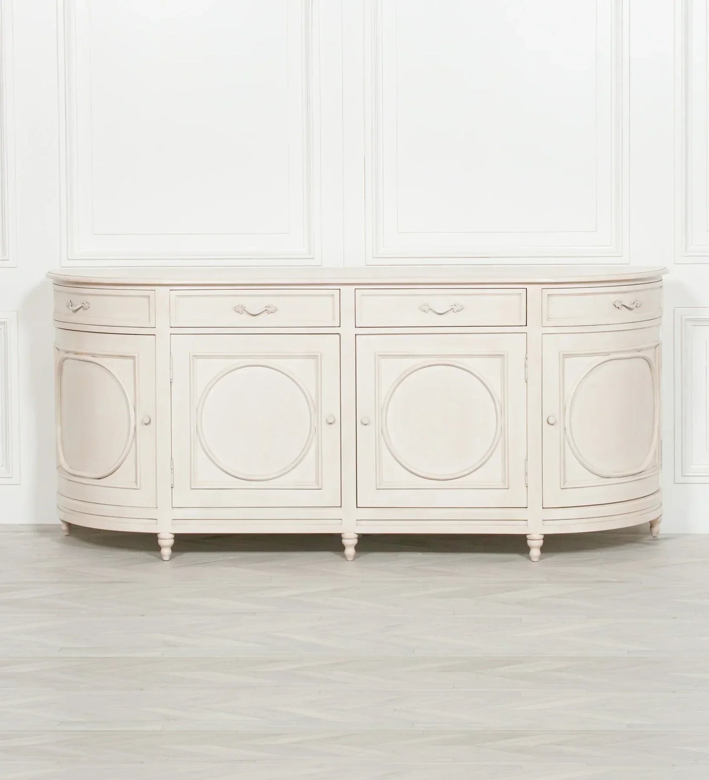 Cream wooden sideboard with four doors, round panel design, and curved front