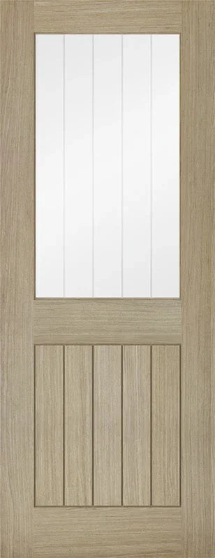 Light grey glazed internal door with vertical panels and clear glass insert