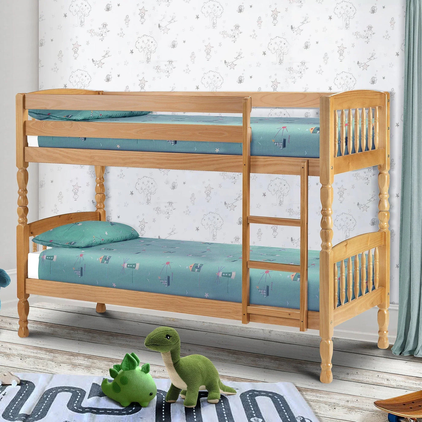 Wooden bunk bed with blue bedding and ladder in a kids’ room with toy dinosaurs on the floor