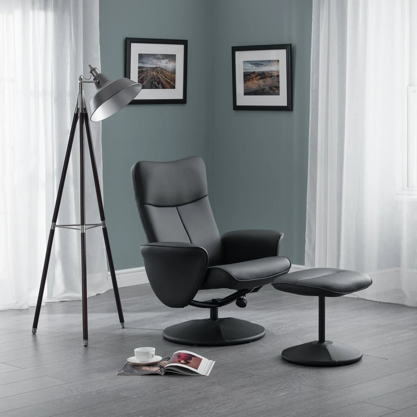 Black Lugano recliner chair with matching stool in modern living room setting
