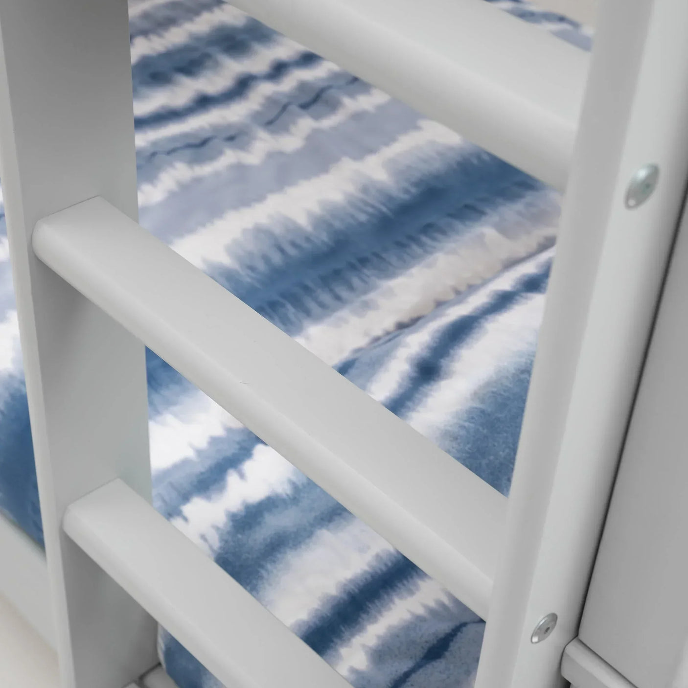 Dove grey bunk bed ladder detail with blue and white bedding visible behind slats
