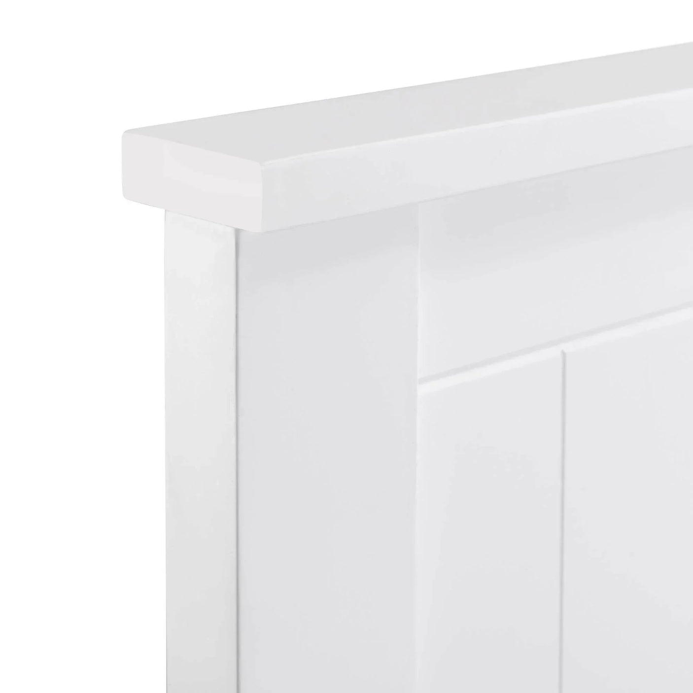White panel bed headboard with smooth finish and vertical groove detail close-up
