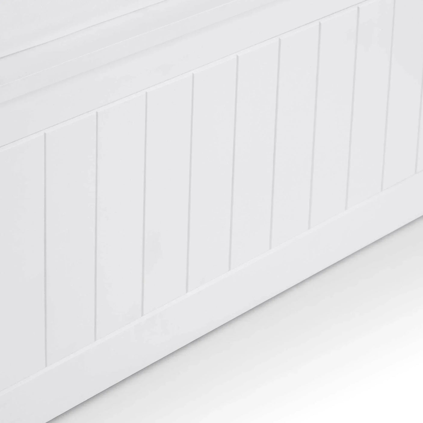 White wooden storage bench with vertical panel detail on front