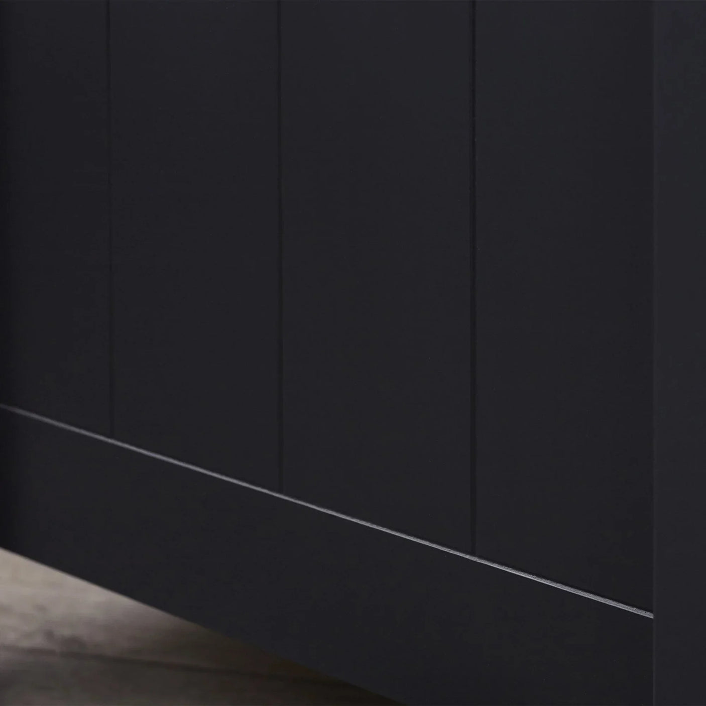 Anthracite bedside table panel detail showing smooth matte finish and vertical grooves