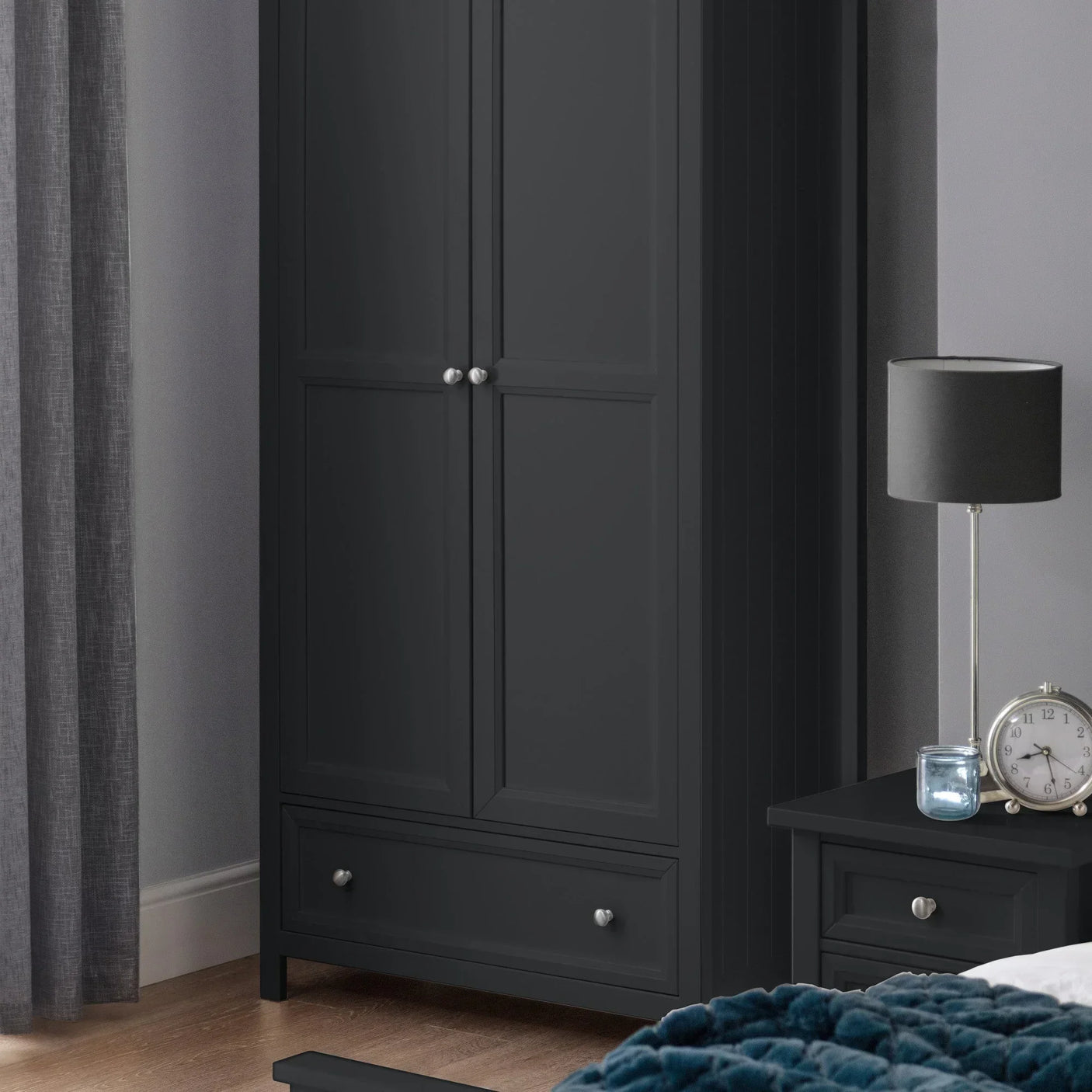 Anthracite two door wardrobe with drawer in bedroom next to matching bedside table