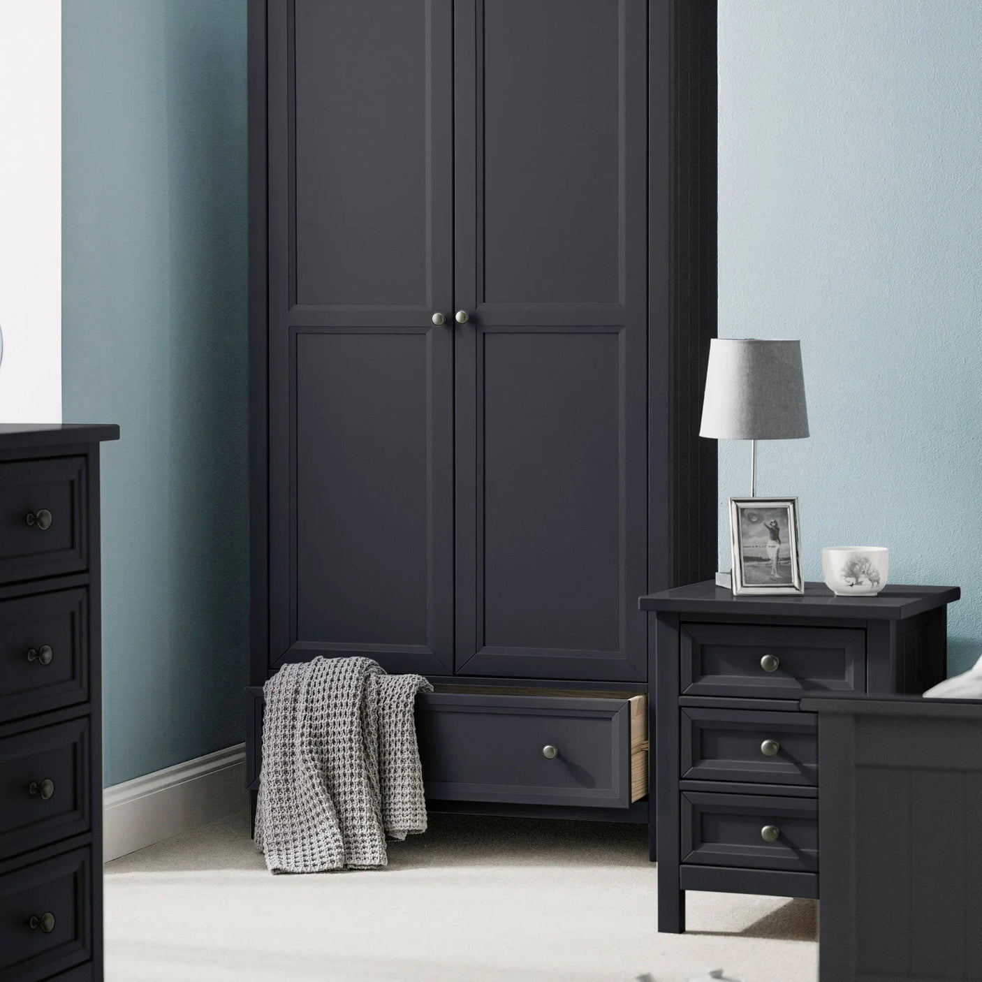 Anthracite two door wardrobe with open drawer in modern bedroom setting