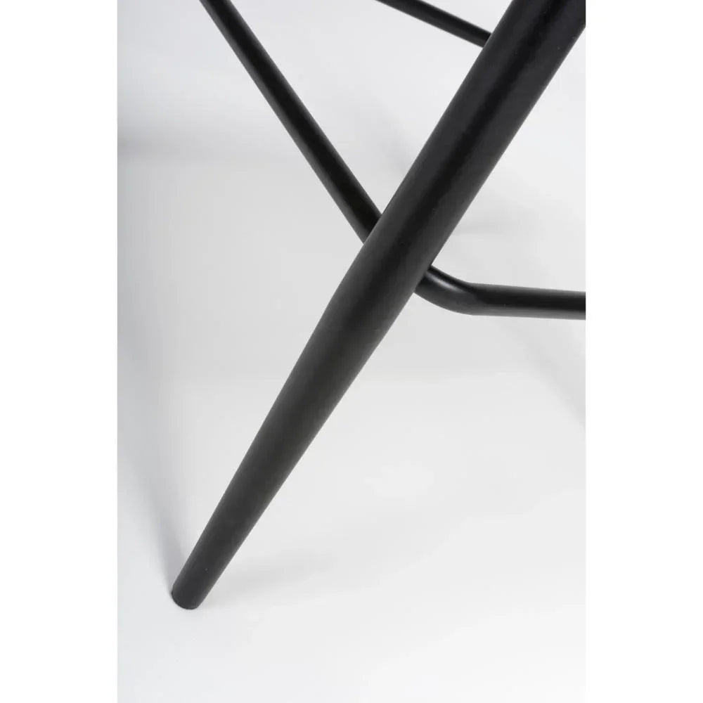 Black metal chair leg with crossbar detail on white background