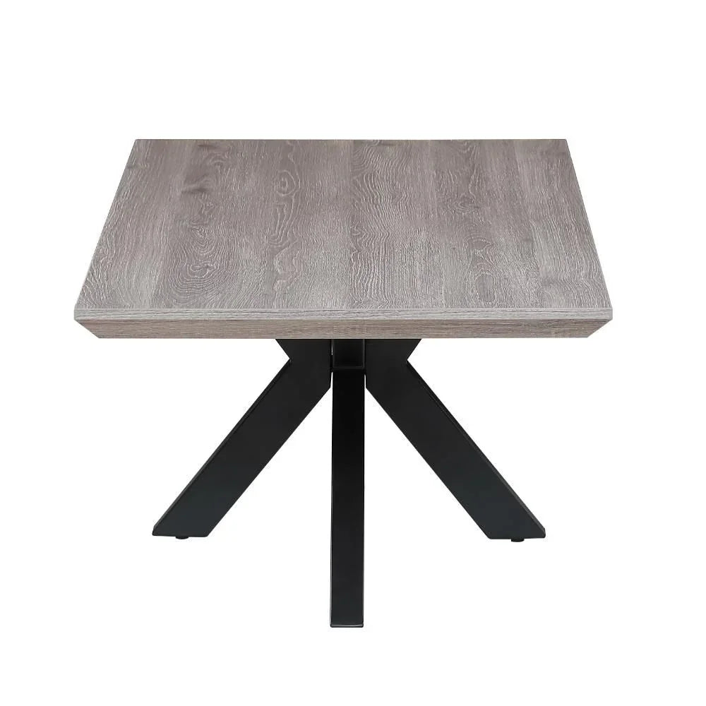 Square dining table with light wood top and black metal legs, viewed from above