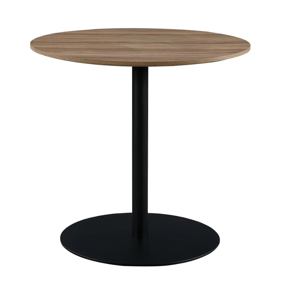 Round wooden dining table with black metal pedestal base