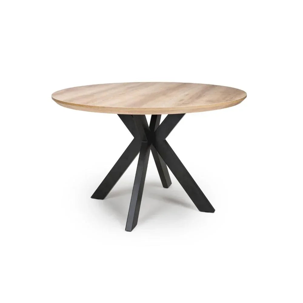 Round dining table with light wood top and black metal cross legs