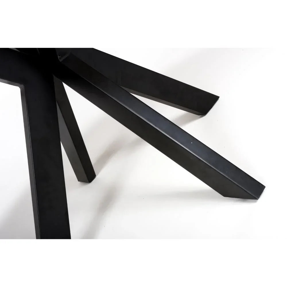 Black metal dining table legs with modern angular design on white background