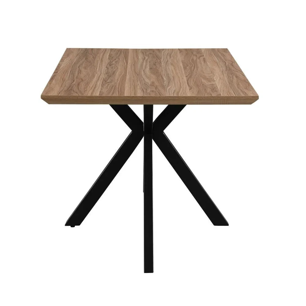 Square dining table with wood grain top and black metal legs, photographed from the front