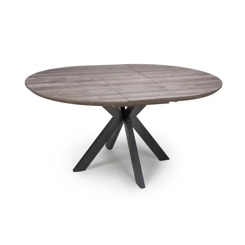 Round dining table with wood top and black angled metal legs