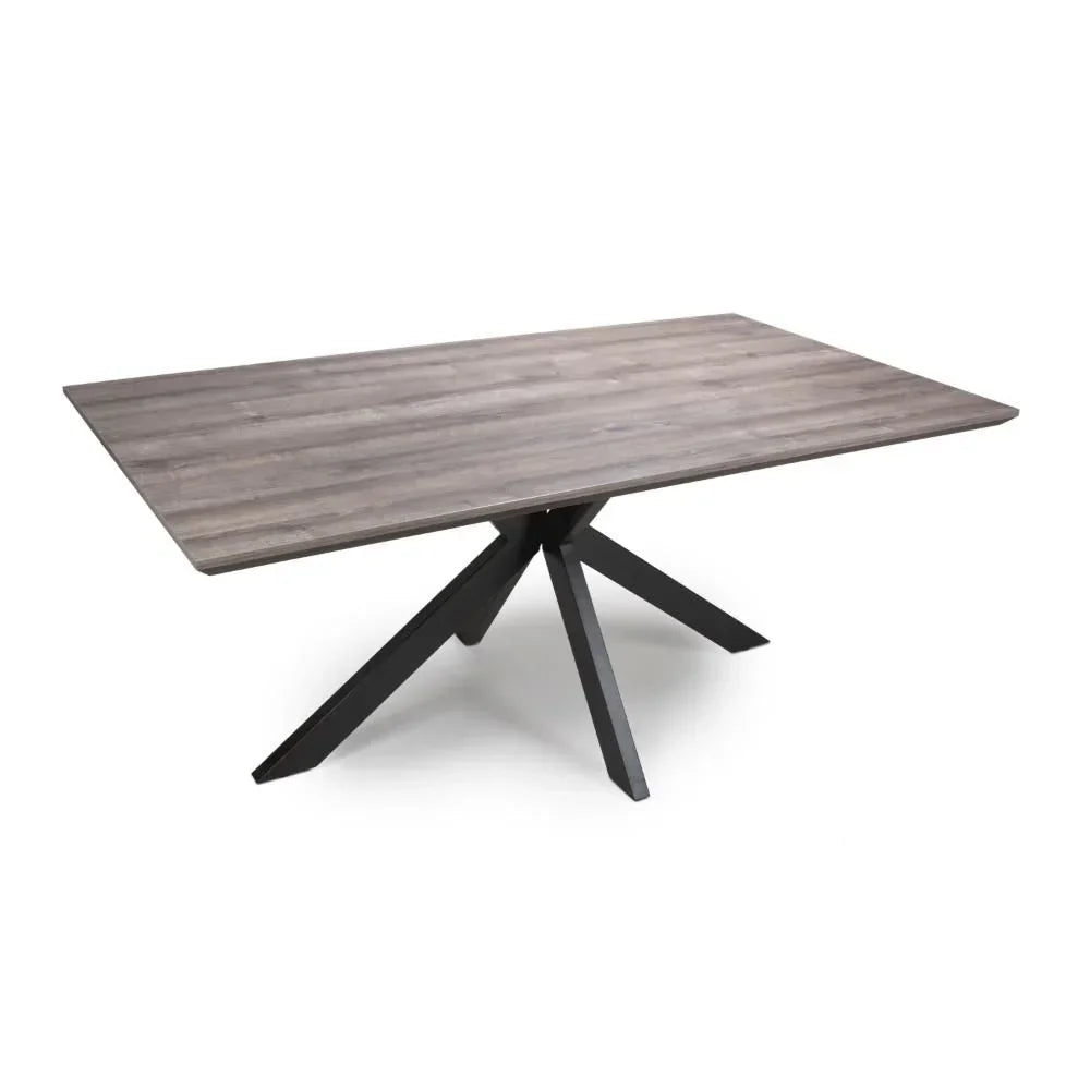 Rectangular wooden dining table with black angled metal legs