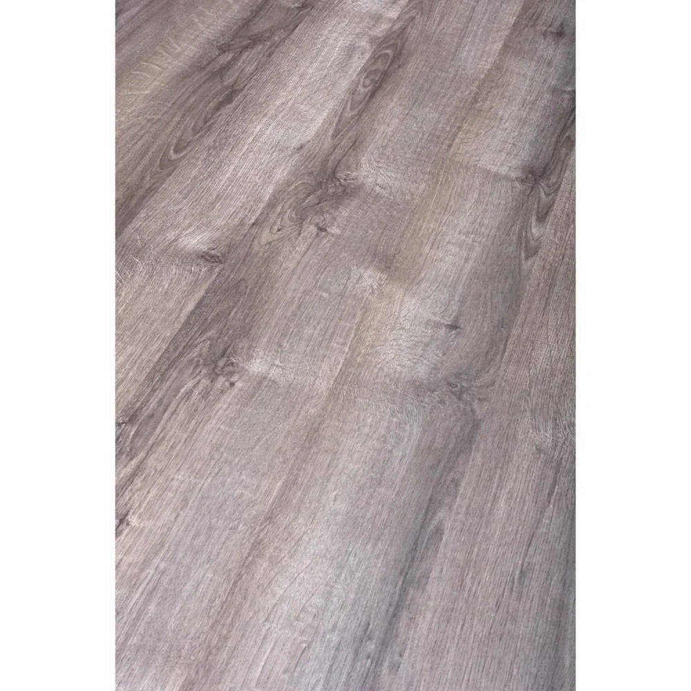 Grey oak effect laminate flooring with wood grain texture and matte finish