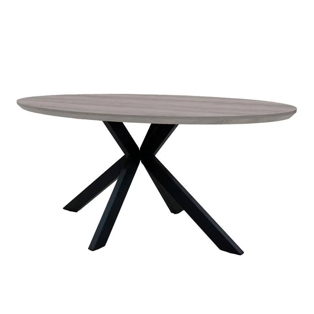 Round dining table with grey wood top and black crossed metal legs