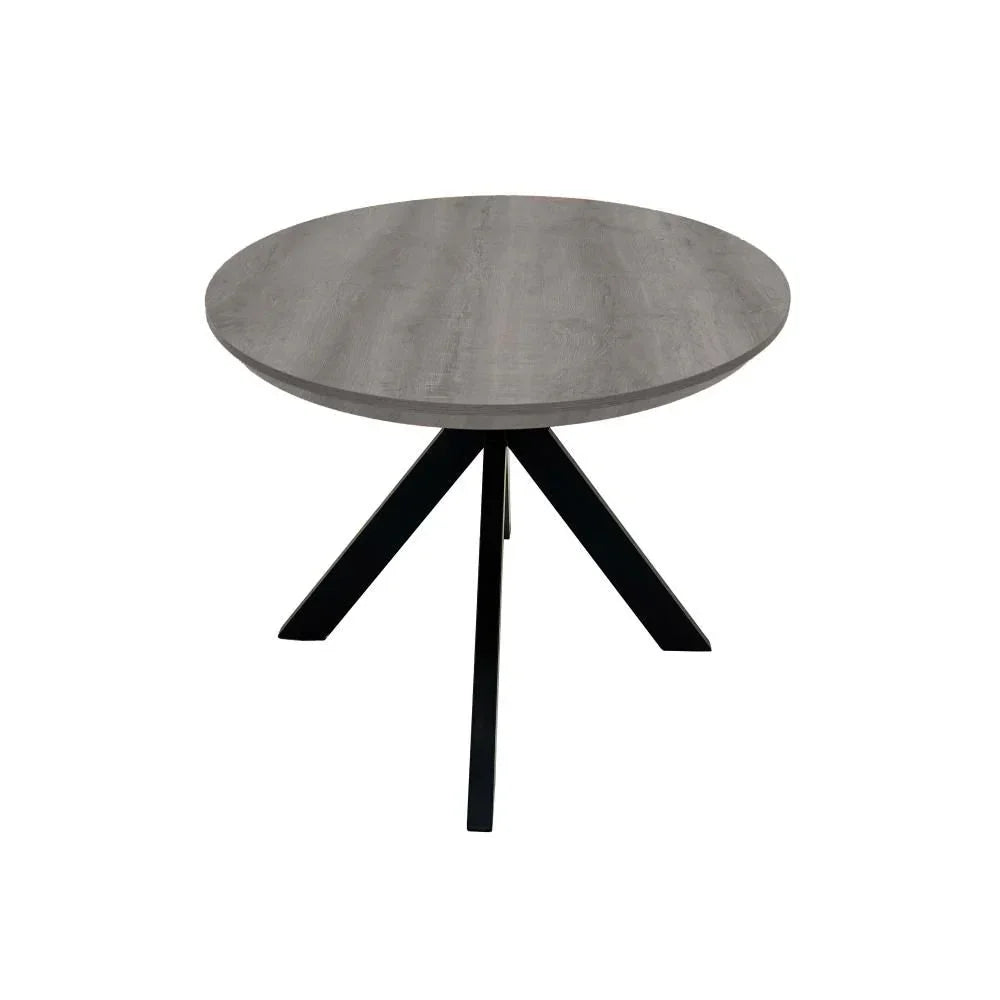 Round dining table with grey wood top and black metal legs, angled front view