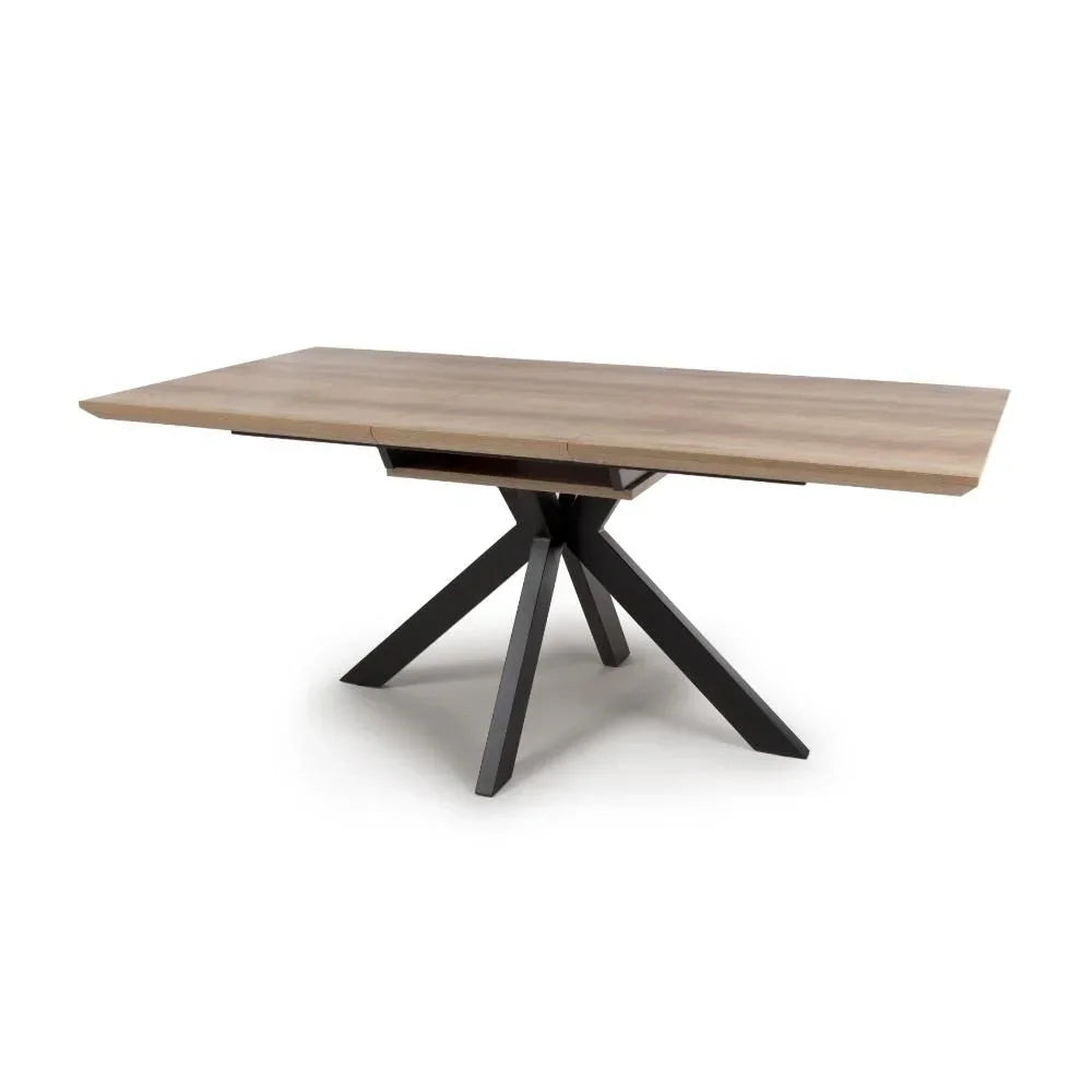 Rectangular wooden dining table with black metal legs and star-shaped base