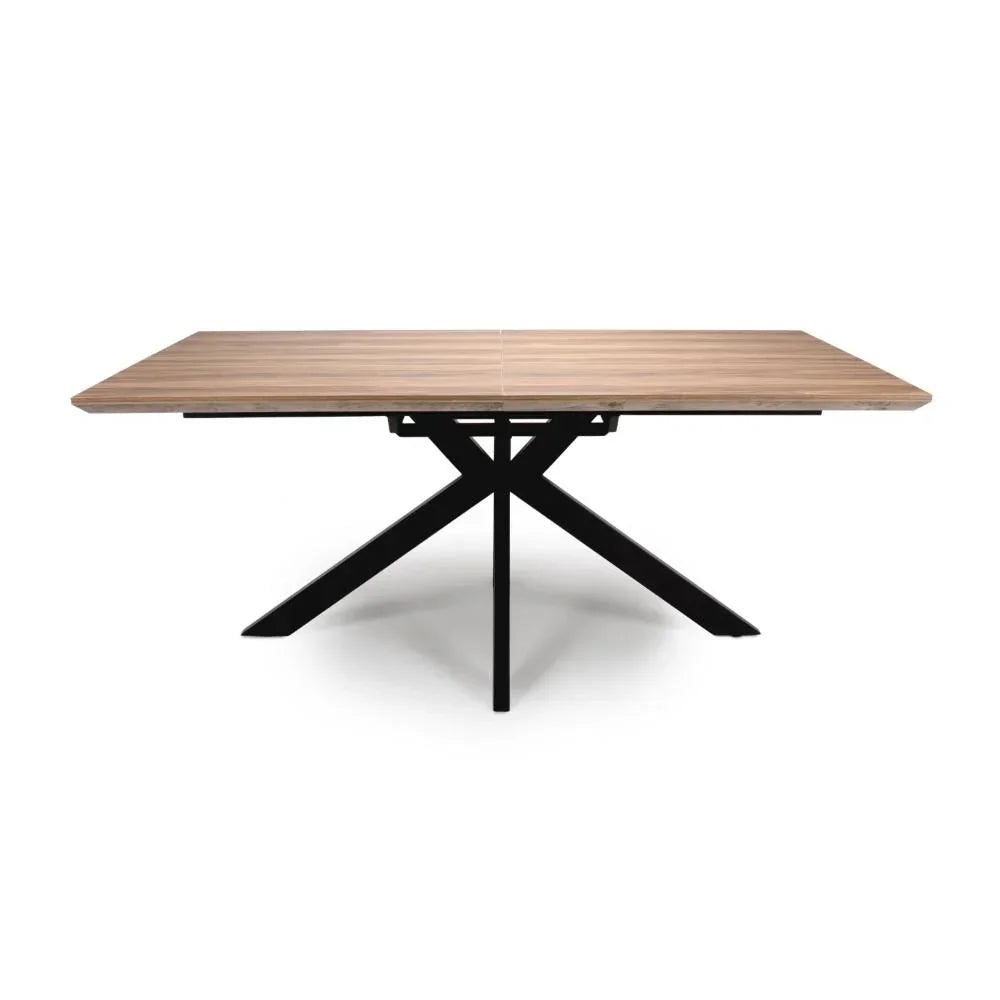Rectangular dining table with wood effect top and black metal crossed legs, front view