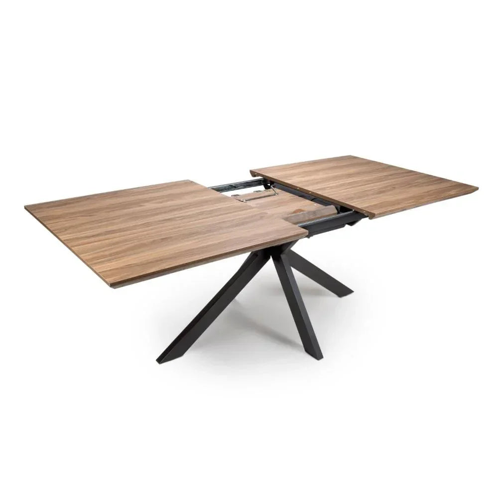 Extendable wooden dining table with black metal legs, top view showing extension mechanism