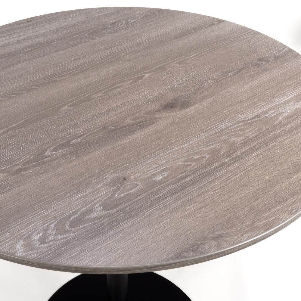 Round grey wood dining table top with wood grain and black pedestal base