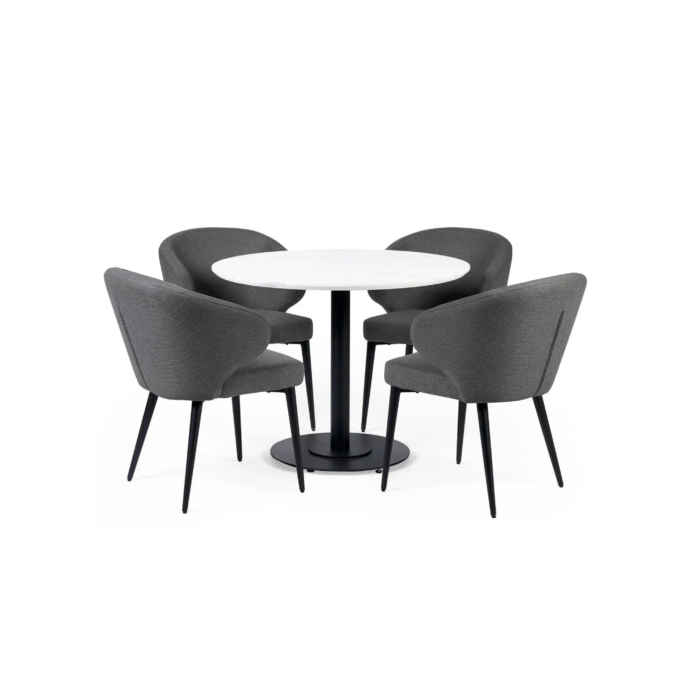 Round dining table with white top and four grey fabric dining chairs on black legs