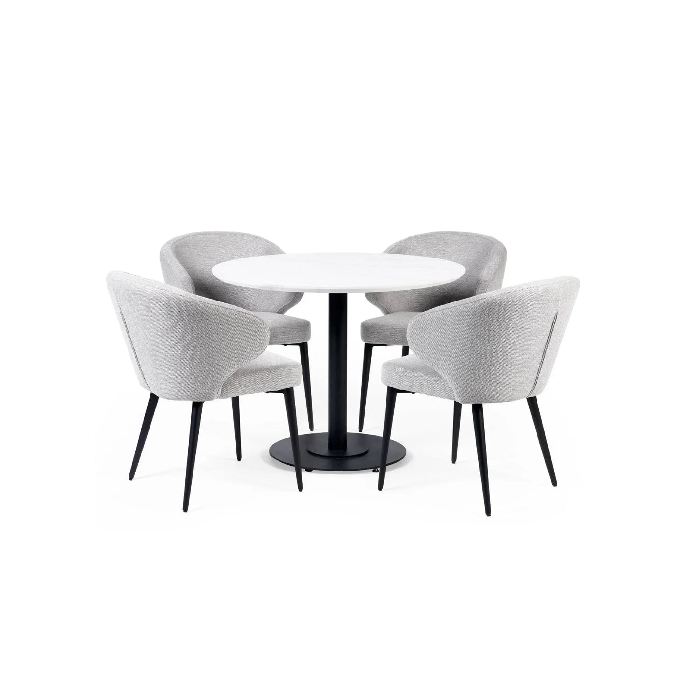 Modern round dining table with four grey upholstered dining chairs and black metal legs