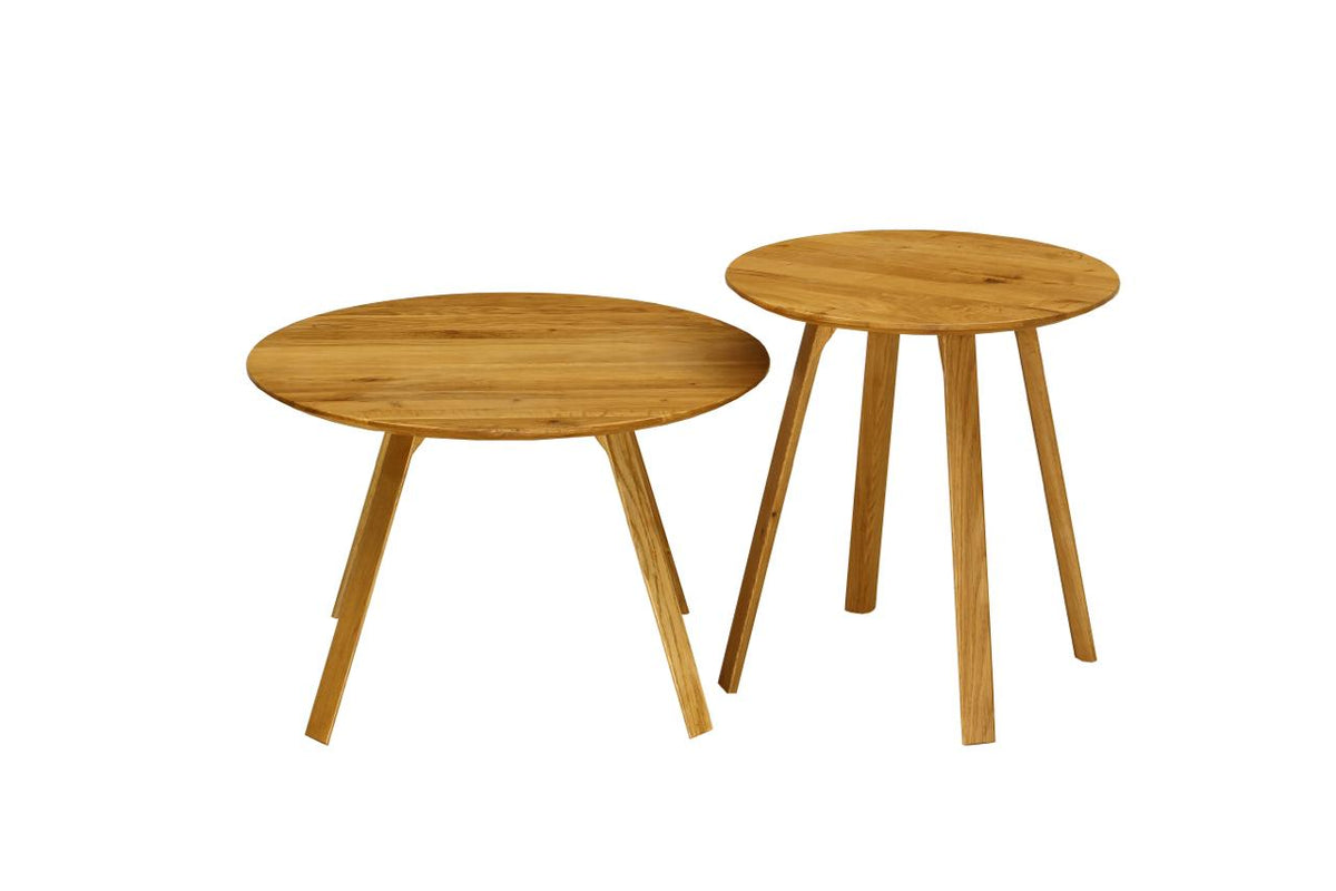 Two round wooden nesting side tables with tapered angled legs, shown on a plain white background.