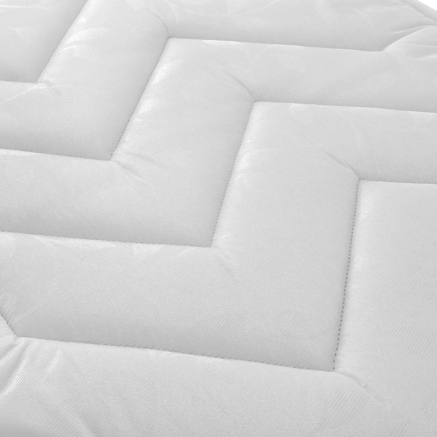 Close up of 90cm semi-orthopaedic mattress surface with white quilted pattern