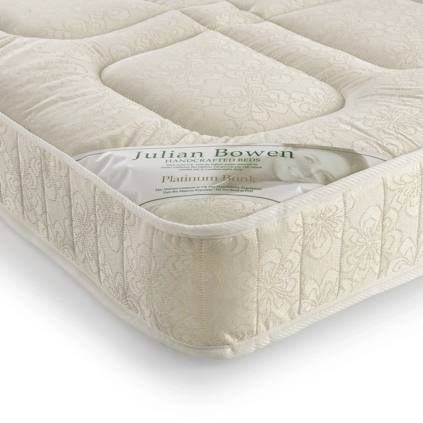Platinum Bunk mattress corner detail with cream floral fabric and visible label
