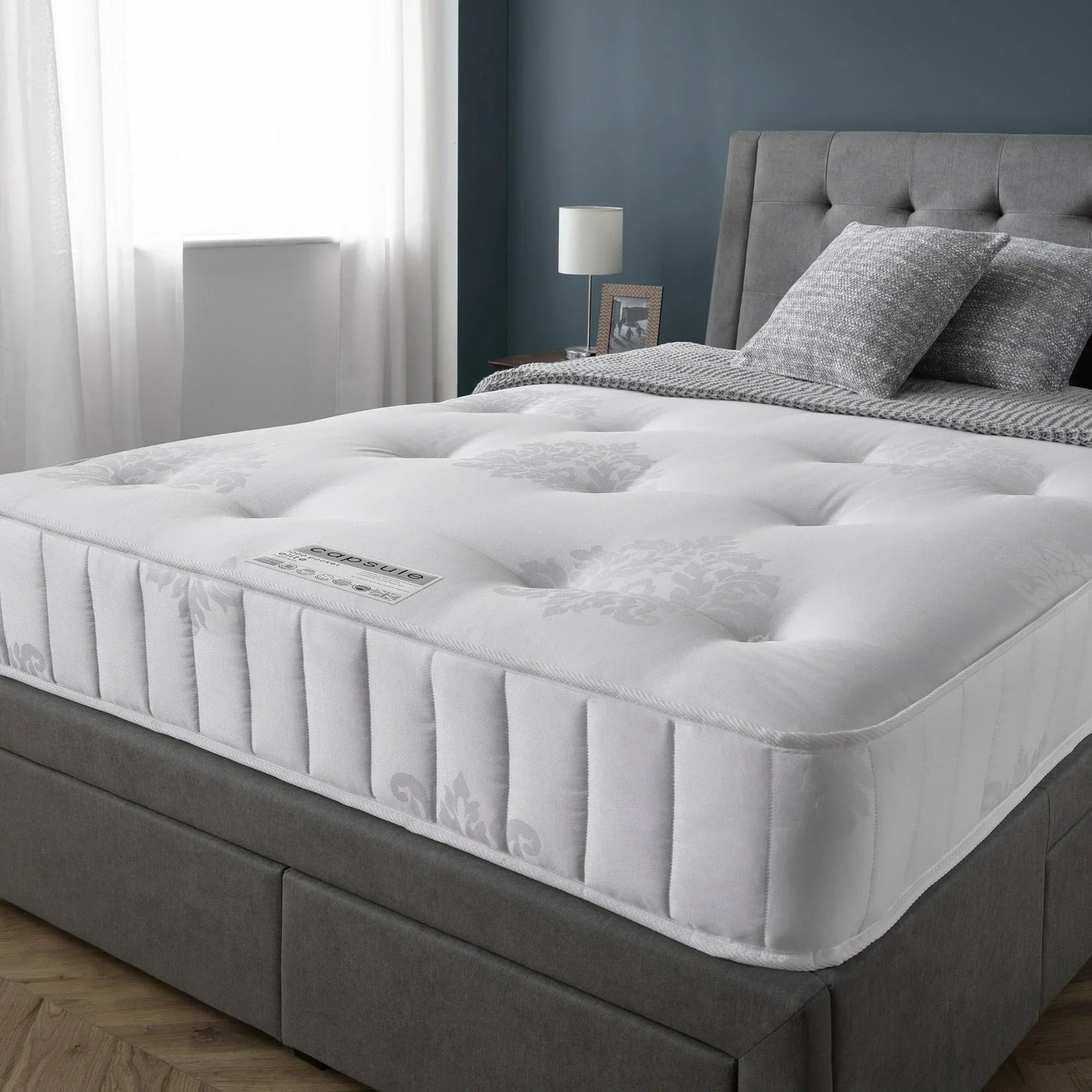 Capsule Elite Pocket Mattress 90cm on grey upholstered bed in modern bedroom