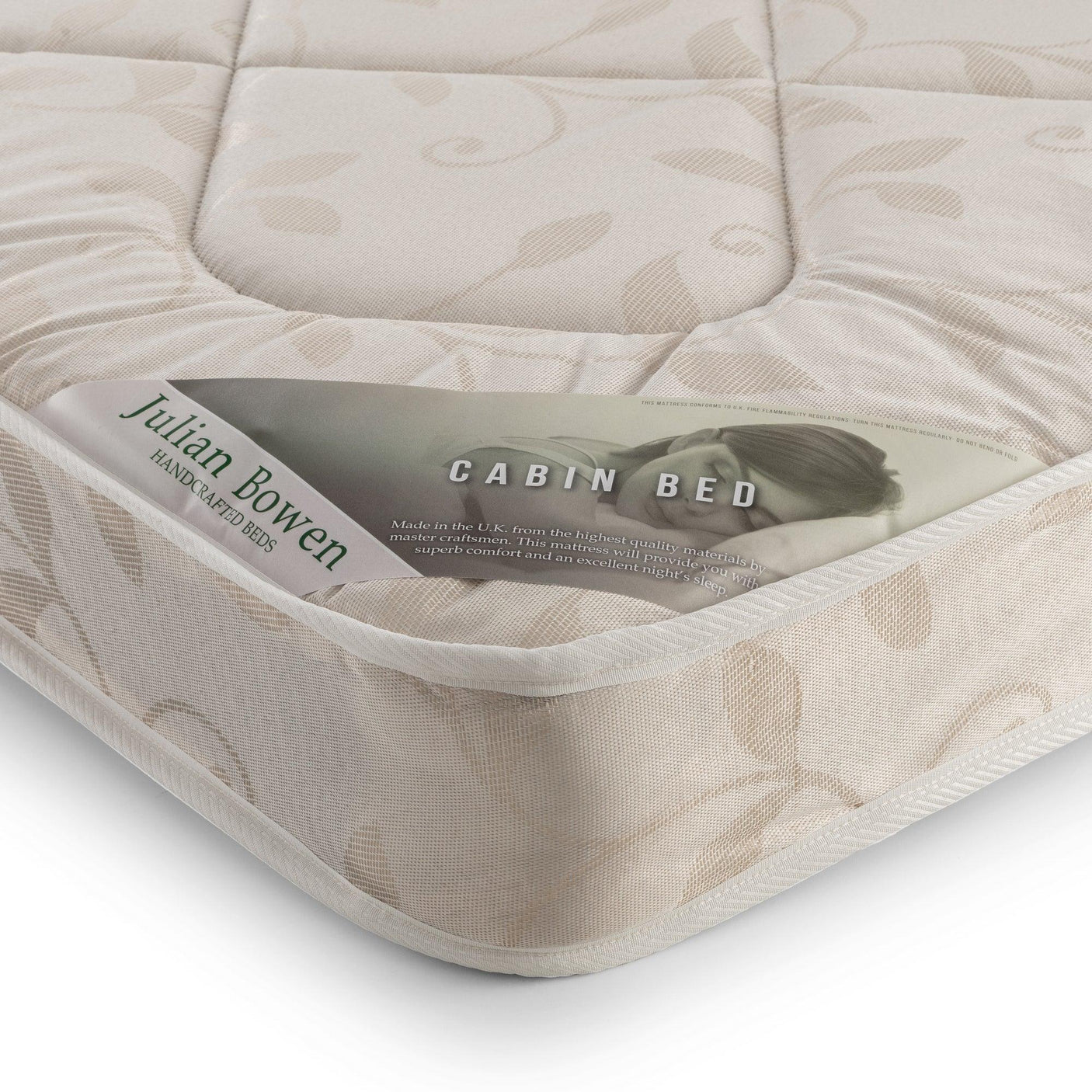 Single cabin bed mattress with leaf pattern cover and visible corner label