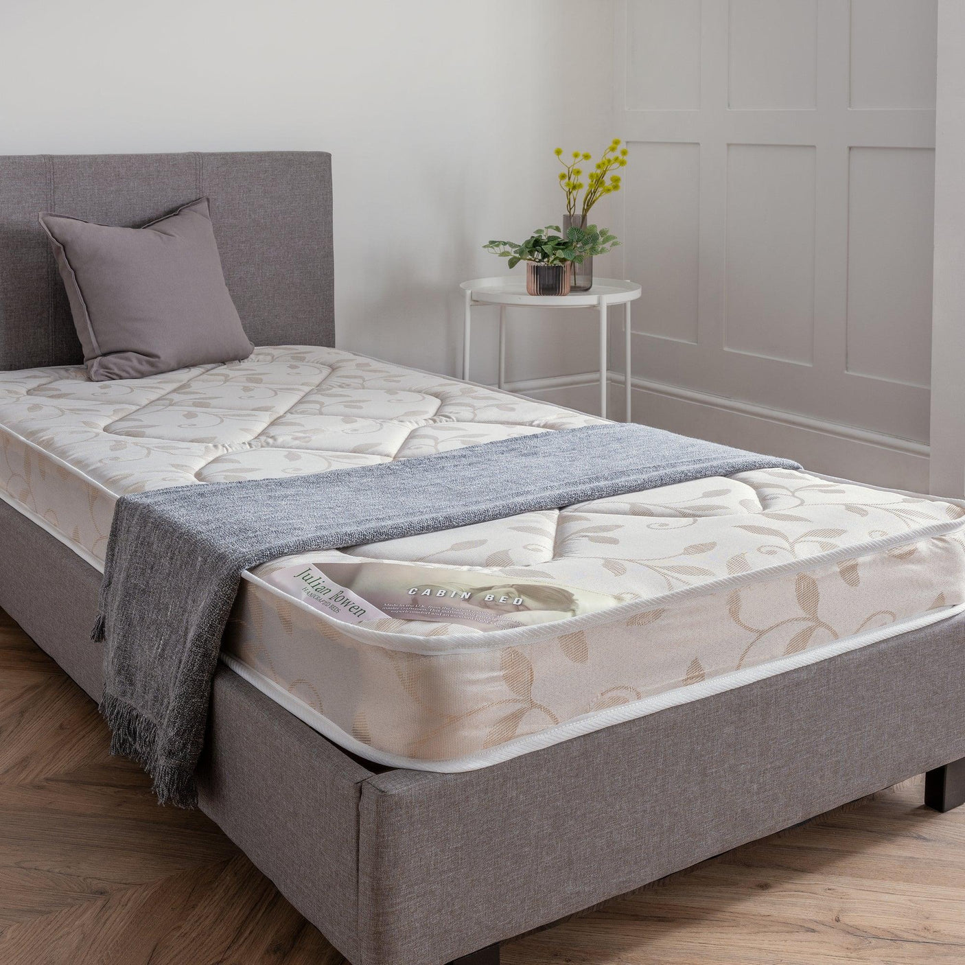 Cabin bed mattress 90cm on grey bed frame in bright modern bedroom