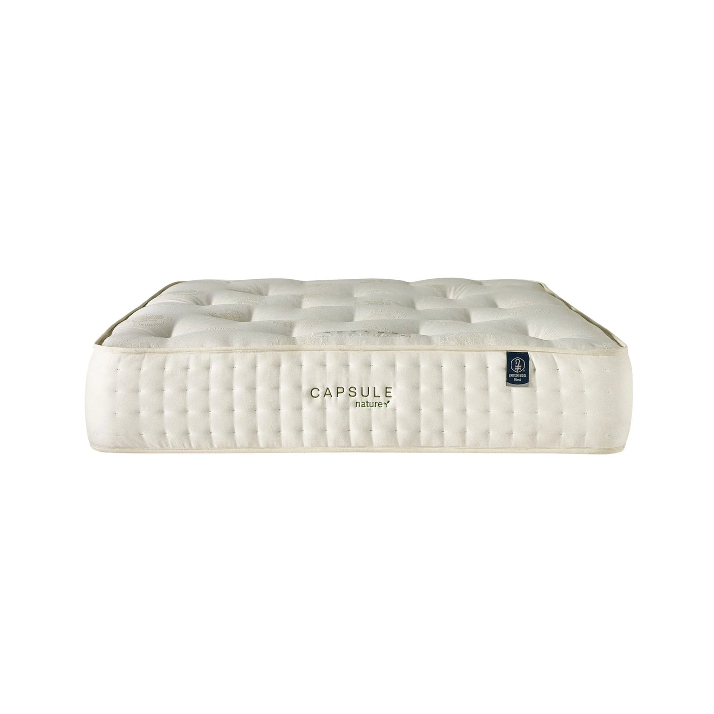Double sided pocket sprung mattress with tufted surface and quilted side panel