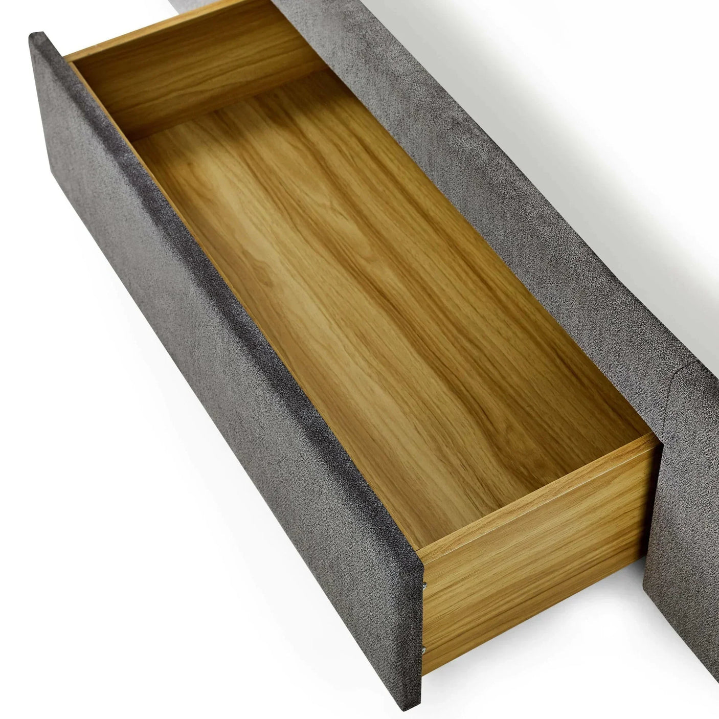Grey fabric bed frame storage drawer with wood interior, viewed from above